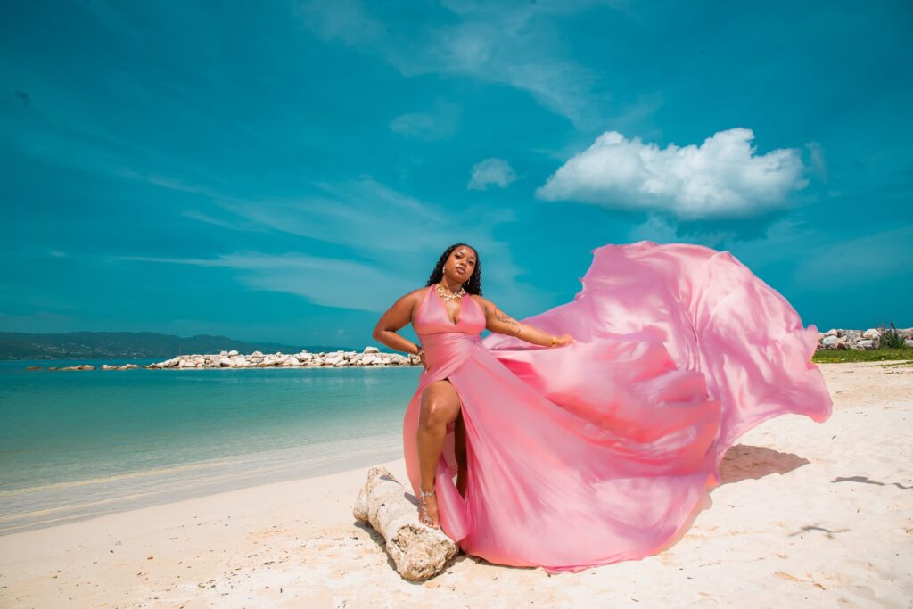 Pink flying dress photoshoot on a Montego Bay beach